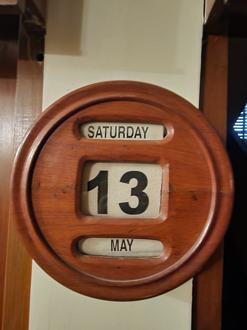 A wooden wall calendar.