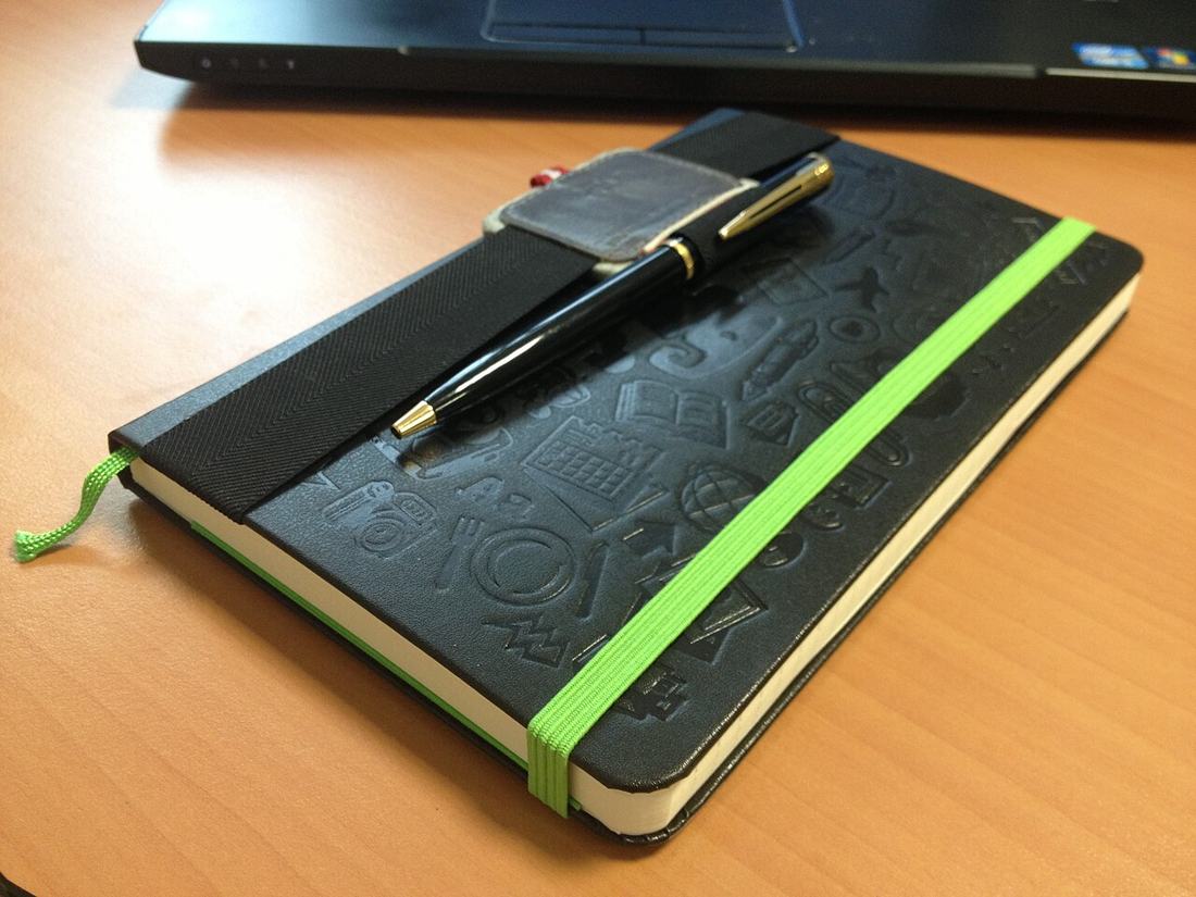 A notebook and pen.
