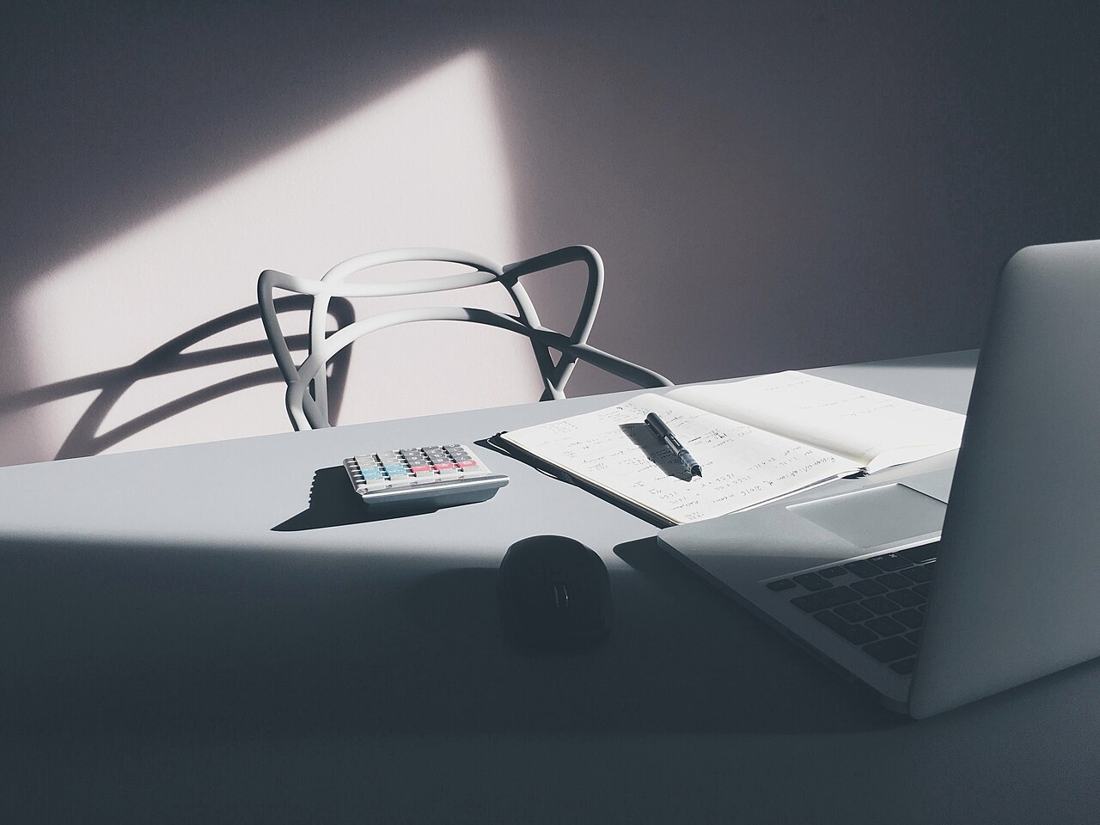 A calculator on a desk.